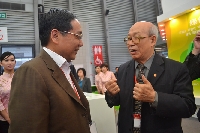 印工協(xié)理事長徐建國（左）與中印協(xié)名譽(yù)理事長武文祥